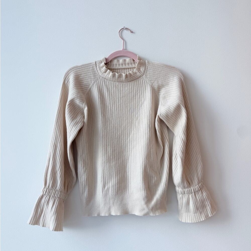 Cream Ribbed Sweater with Ruffle Details